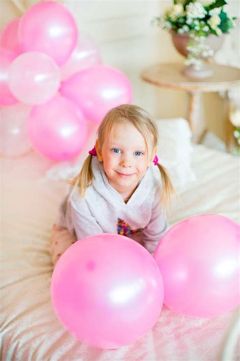 Little Girl Playing with Pink Balloons Stock Photo - Image of caucasian, delight: 69881738