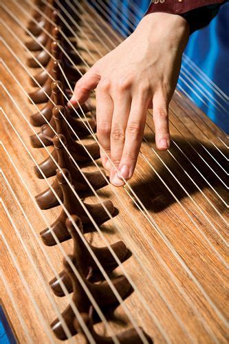 Gayageum: A traditional 12-stringed Korean instrument. I love the sound of this instrument, it ...