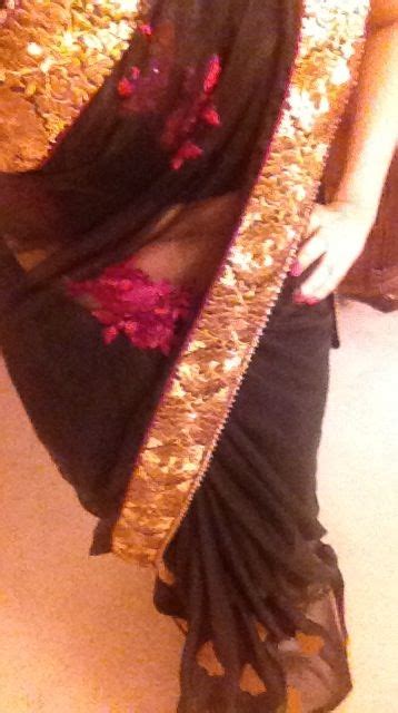 My black net saree with gold borders and pink flowers on pallu -Harman Kaur | Black net saree ...