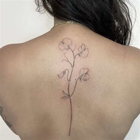 Discover 86+ flowers down spine tattoo - in.cdgdbentre