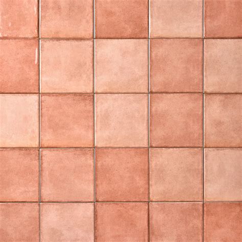 an image of a tile wall that looks like it has been painted pink