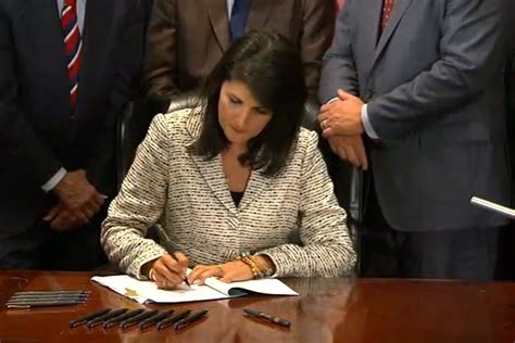 South Carolina Gov. Nikki Haley Signs Bill Removing Confederate Flag ...