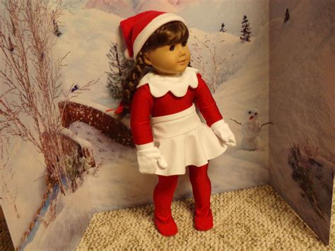 Elf on the Shelf (girl) fits most 18 inch dolls asking $15.00 includes unitard, skirt, mittens ...