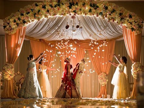 9 Things to Expect When Attending Your First Indian Wedding | Wedding stage decorations, Indoor ...
