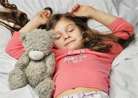 Little girl sleeping in bed — Stock Photo © nelyninell #35880709