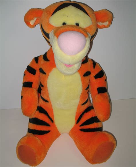 TIGGER talks and is soooo cute. Give hime a hug and he'll say, "I'm Tigger," "You're the Best ...