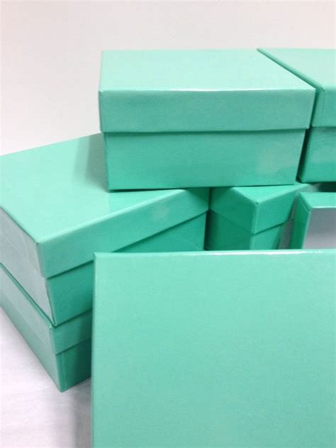 Teal blue boxes in a popular tiffany blue hue. | Boxes packaging, Craft packaging, Glass display ...