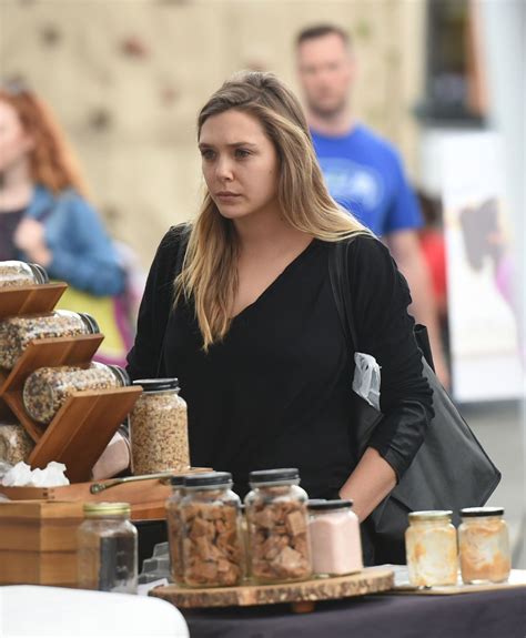 Elizabeth Olsen at a Farmer's Market in Los Angeles 10/16/ 2016 • CelebMafia