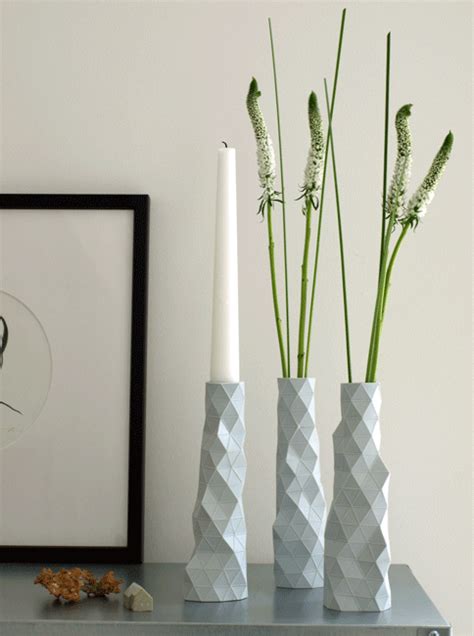 faceted bud vase/candleholders | Futuristic interior, Futuristic interior design, Geometric ...
