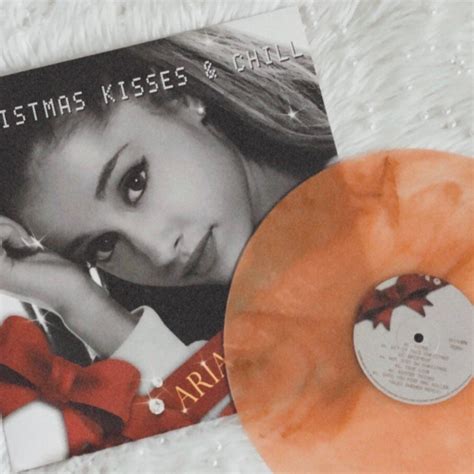 marilyn 🦋 on Instagram: “ariana grande - christmas kisses & chill (2018) • 🌙 unoffical orange ...