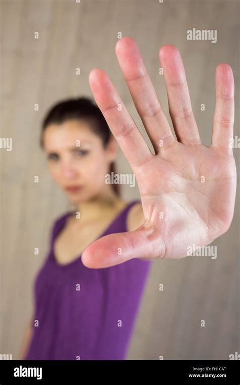Portrait of serious woman with stop sign Stock Photo - Alamy