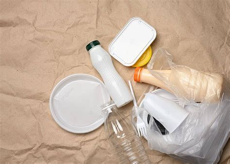 Environmental Pollution Plastic Waste Against A Brown Kraft Paper ...