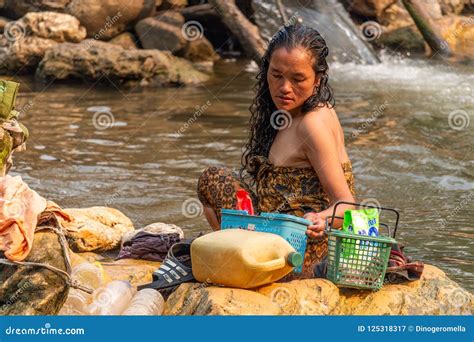 Bathing in a river Laos editorial photography. Image of children ...