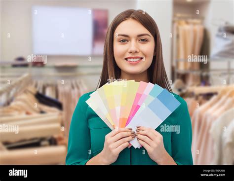 woman with color swatches at clothing store Stock Photo - Alamy