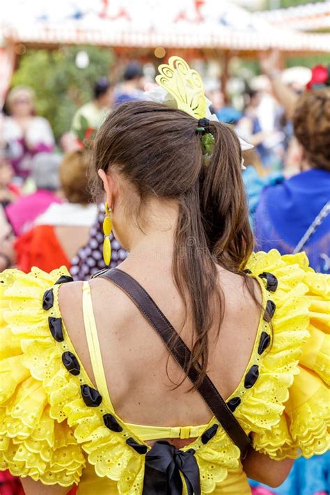 Young Pretty Smiling Woman Dressed in Traditional Costumes at the Seville`s April Fair ...