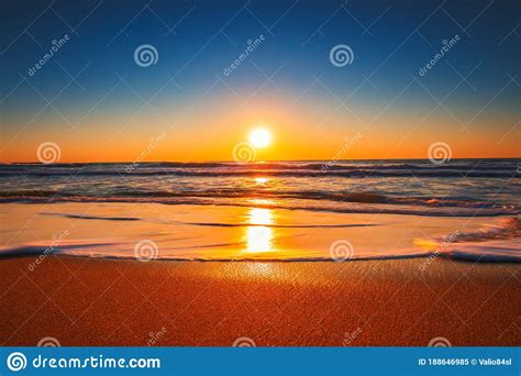 Beach Sunrise or Sunset with Clear Blue Sky and Rising Sun Stock Image - Image of scene, dawn ...