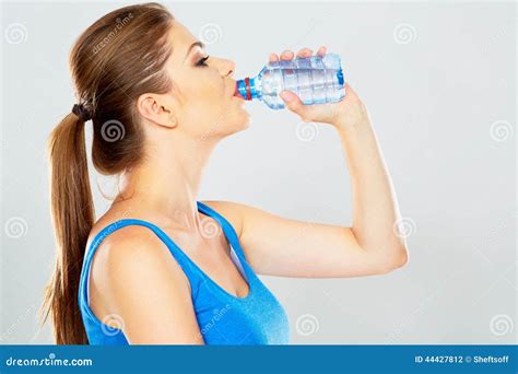 Sporty Woman Drinking Water of Bottle Stock Photo - Image of hold, health: 44427812