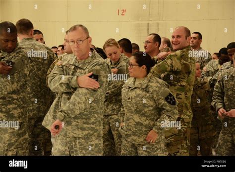 Washington Army National Guard soldiers of the 81st Stryker Brigade Combat Team don the 2nd ...