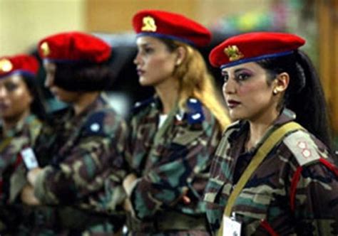 At a glance: Colonel Gaddafi's fascination with virgin female bodyguards