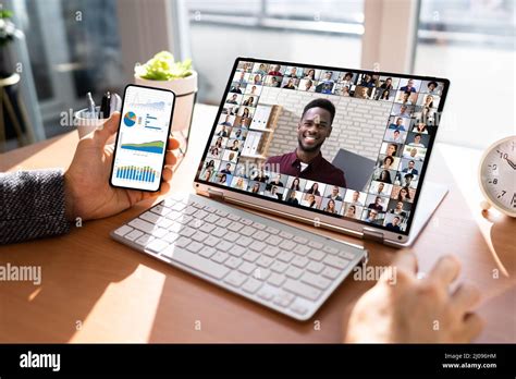 Digital Video Presentation On Hybrid Computer. Videoconference Meeting Stock Photo - Alamy