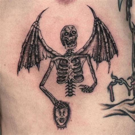 Skeleton Chest Tattoo with Demon's Head