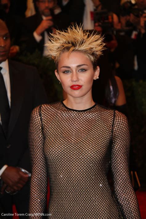 Miley Cyrus’s Met Gala look: mesh dress and spiked hair – Starcasm