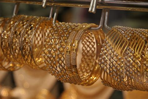 Gold bracelets on display on gold souk | Ian Lloyd | Flickr
