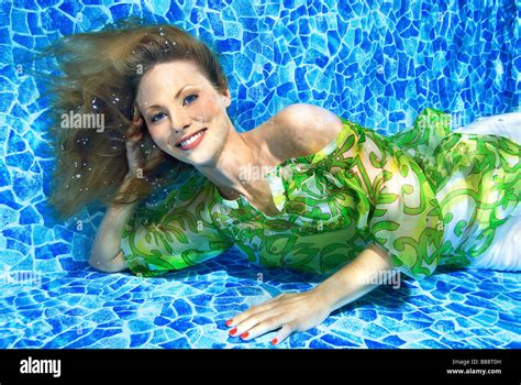 Underwater model shoot, fashion photography in a pool Stock Photo - Alamy