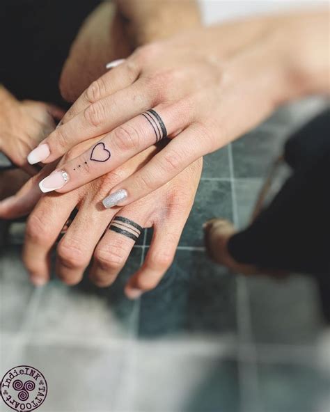 30+ Unisex Wedding Ring Tattoos for Couples - 100 Tattoos in 2023 | Tattoo wedding rings, Finger ...