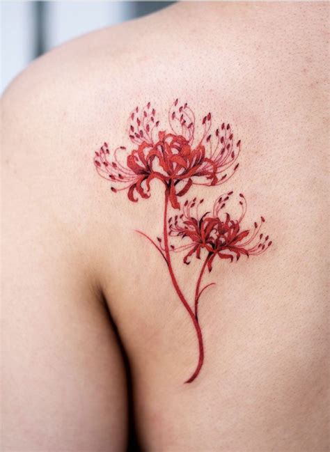 Oozy spider lily flower tattoo | Idee per tatuaggi, Tatuaggi, Tatuaggi incredibili