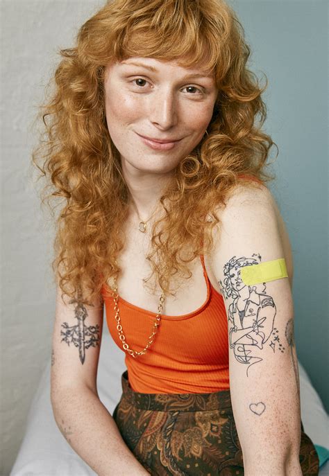 Woman with band-aid on her upper arm | Photographer: Heather… | Flickr