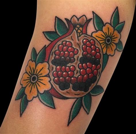 Pomegranate Tattoo: Exploring Its Symbolism and Designs | Art and Design