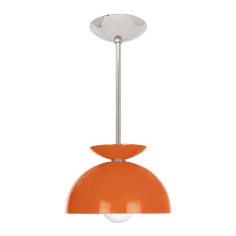 an orange pendant light hanging from a ceiling fixture with a white dome on the top