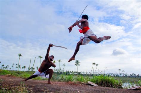 two men holding sword fighting during daytime free image | Peakpx
