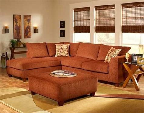 Living Room With Rust Colored Sofa - CliffordMathews