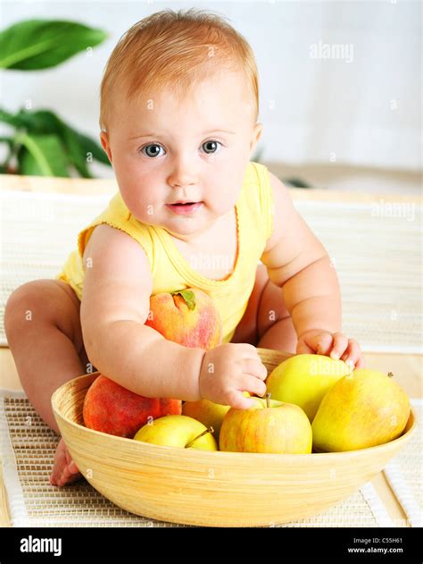 Little baby choosing fruits closeup hi-res stock photography and images - Alamy