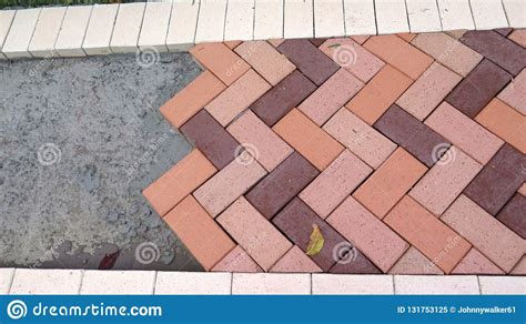 Partly Finished Colored Brick Pavement Stock Image - Image of colored, material: 131753125