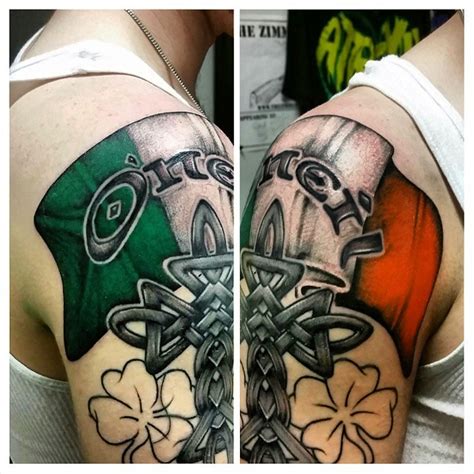 Neo traditional style colored shoulder tattoo of Irish flag with cross ...