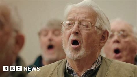 Flintshire male voice choir sings its way into cinemas - BBC News