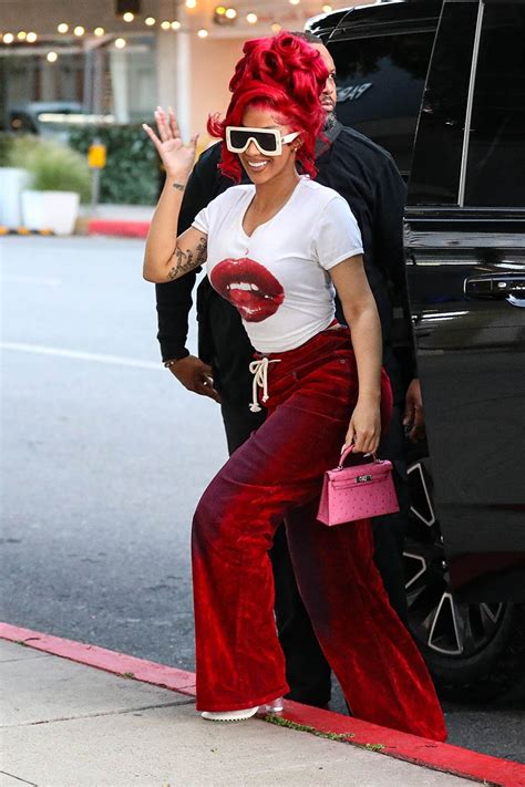 *EXCLUSIVE* Beverly Hills, CA – Cardi B shows off her stylish red outfit arriving for a business ...