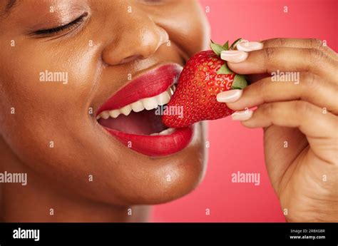 Strawberry, lipstick and woman lips eating, eco friendly product and ...