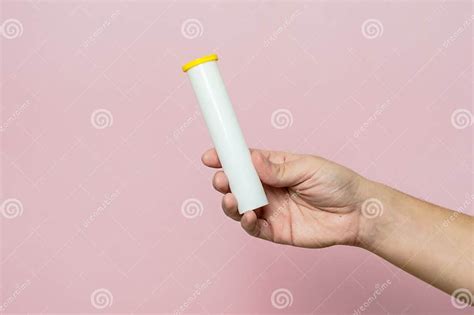 Hand Holding Bottle for Pills, Effervescent Tablets or Vitamin Stock Photo - Image of closeup ...