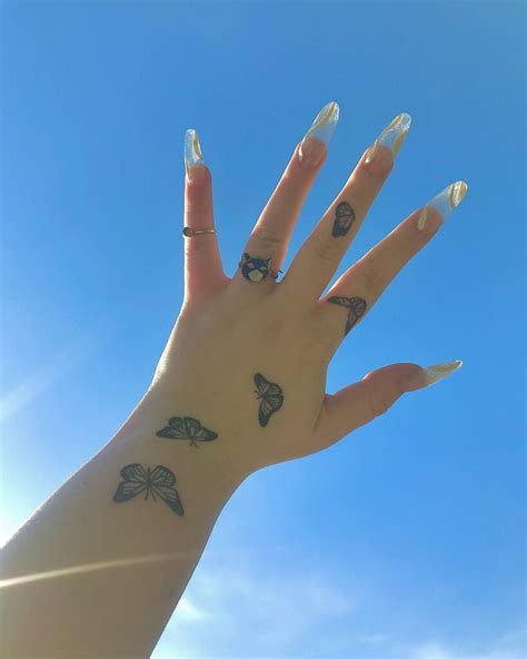 Butterfly Finger Tattoos