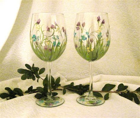 Wild flowers hand painted on wine glasses