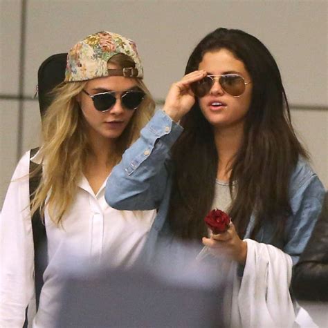 Selena Gomez & Cara Delevingne at LAX Airport in LA - July 2014 ...