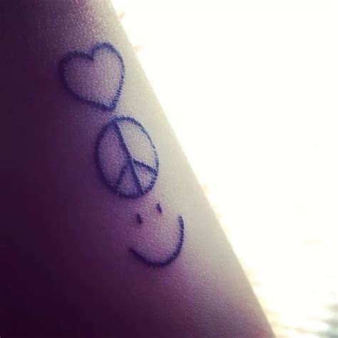 My lovely tattoo Love, peace happiness = Harmony | Love wrist tattoo, Peace sign tattoos, Peace ...