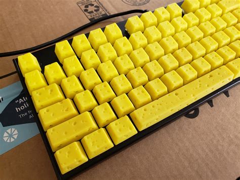 Keyboard with cheese styled keycaps