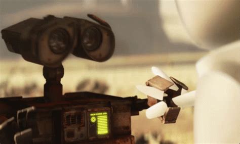 Wall E Eve GIF - WallE Eve HoldHands - Discover & Share GIFs