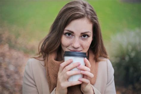 woman, camel jacket, scarf, holding, white, black, disposable, coffee cup | Piqsels