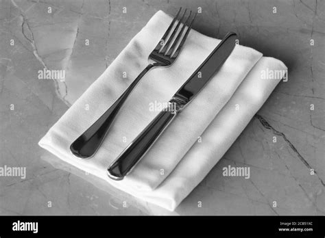 Dinner table setting reserved Black and White Stock Photos & Images - Alamy